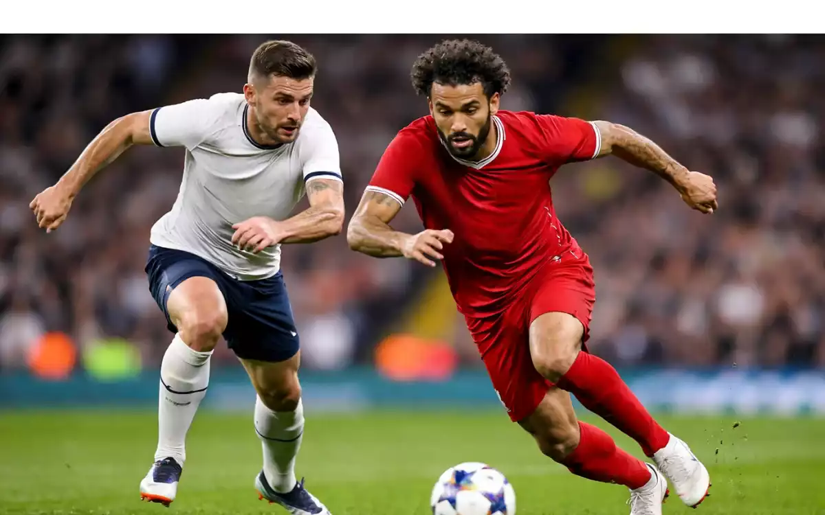 Jugador de f&uacute;tbol superando a un defensor con el bal&oacute;n en los pies